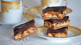 Батончик сникерс