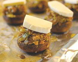 Фаршированные грибы с оливками и орехами