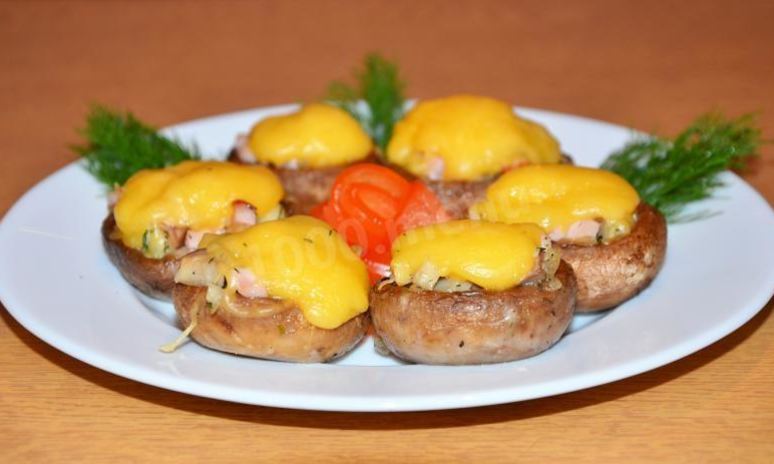 Рецепт фаршированных шампиньонов под сырной шапочкой
