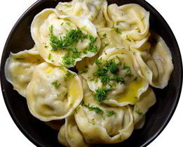 Пельмени с помидорами