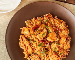 Пряный пилав с курицей и вялеными томатами