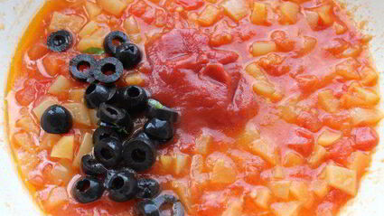 кальмар, фаршированный красным рисом