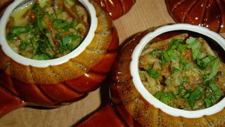 Рыба с овощами в горшочке