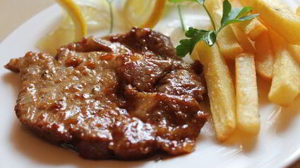 свиной стейк в апельсиновом маринаде