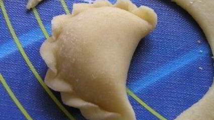 вареники с черникой и соусом под шафе