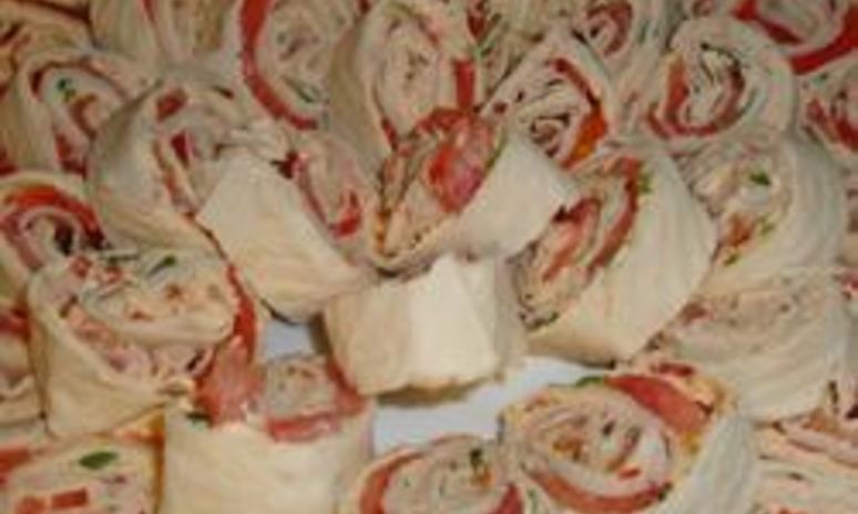 Рецепт рулетиков из лаваша с семгой и ветчиной