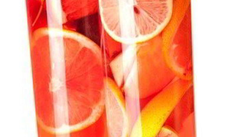 Рецепт компота из красных апельсинов, грейпфрутов и граната с белым вином и шерри